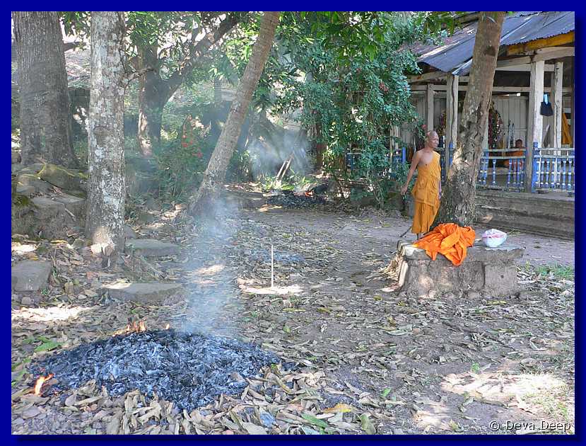 576  Champasak Wat Phu Champasak Monks-fire-smoke