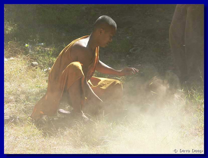 604  Champasak Wat Phu Champasak Monks-fire-smoke