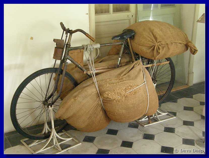 Saigon Museum of HCMC Bike with sacks-035